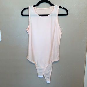 Peach spandex bodysuit
